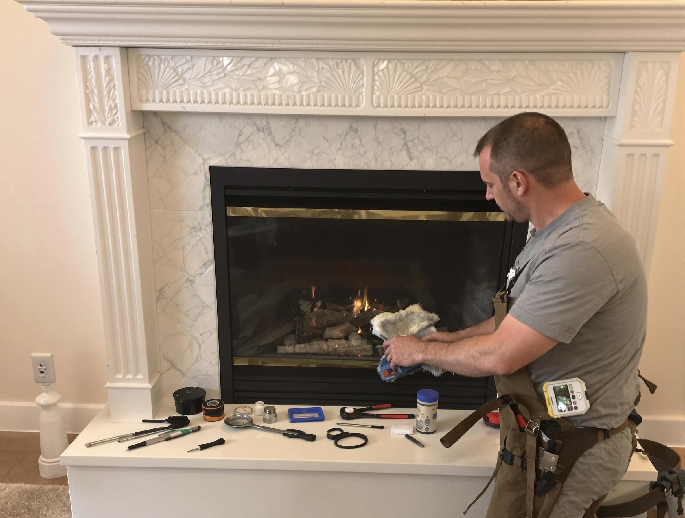 Ashland Chimney Sweep performing fireplace maintenance in Ashland, VA